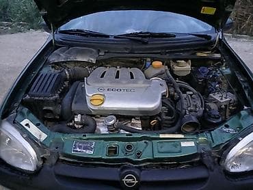 nissan note 1999: Opel Astra Caravan (ya da Astra F Universal) – yaşıl rəngli, 5 qapılı — 9