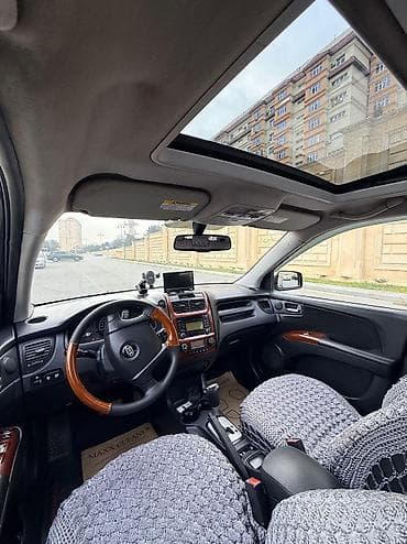 kia sportage qiyməti: Kia Sportage: 2.7 l | 2008 il Krossover — 7