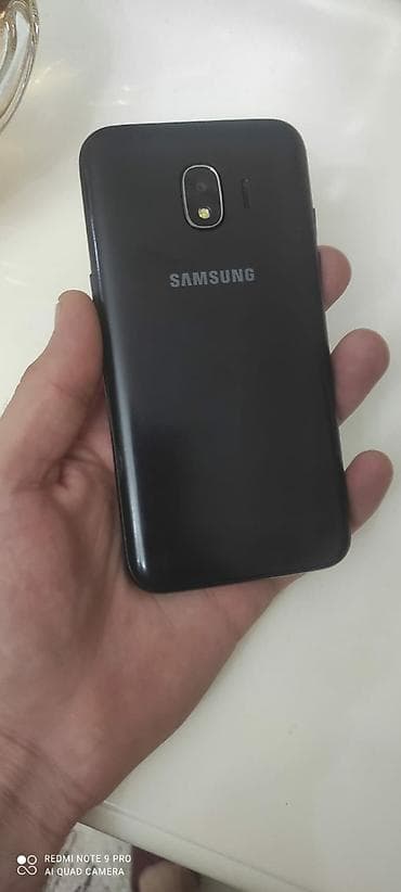 tecno spark silim: Samsung J210, 16 GB, rəng - Qara, İki sim kartlı — 2