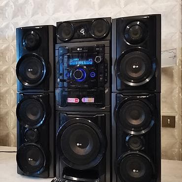 mikrofon tutucu: LG ev audio sistemi – güclü çoxkomponentli Hi‑Fi set Xüsusiyyətlər: - — 1