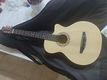 pullar: Akustik gitara – kəsikli (“cutaway”) korpus dizaynı Metrolara — 3