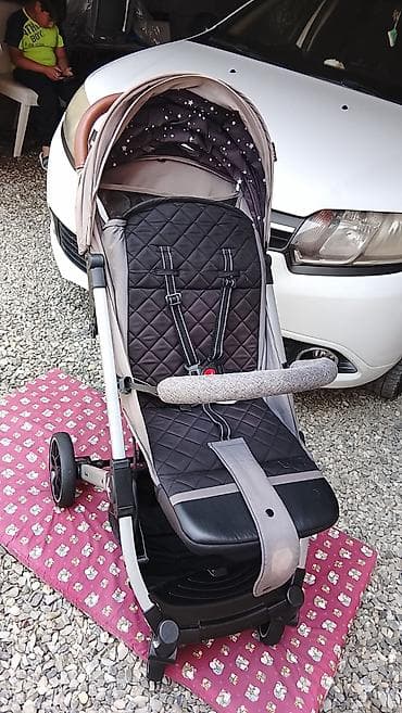 Hevva Kidillo usaq arabası 60 manata satılır.oturaq ve uzanaq olur.( — 2