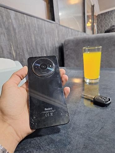 black shark 5: Redmi smartfon Xüsusiyyətlər: - Arxa tərəfdə dairəvi modulda — 1