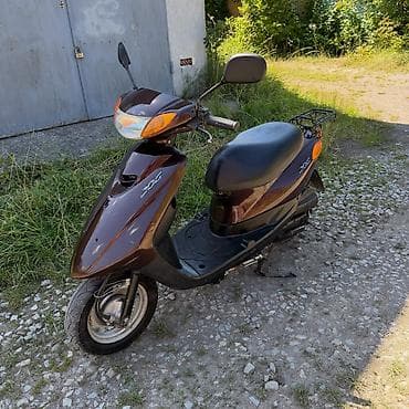 qolf kar: Yamaha JOG skuter - Rəng: tünd qəhvəyi/gavalı tonları, qara plastik — 1
