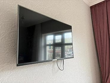 televızor: Divara quraşdırılmış LED televizor. Xüsusiyyətlər: - Təxminən 40–43 — 1
