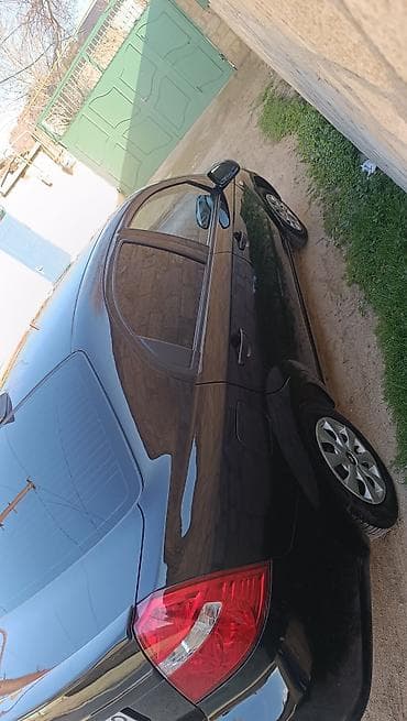 vaz 21 06 matoru: Chevrolet Aveo sedan – qara rəng, Azərbaycan nömrə nişanı 99-CH-962 — 4