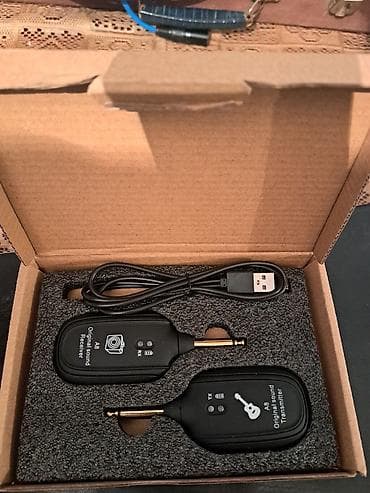 Qarmonlar: Simli kabellərə ehtiyac olmadan gitara üçün naqilsiz audio sistemi — 1