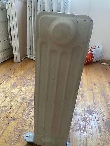 Elektrikli yağ radiatoru satılır. Yaxşı qızdırır və tam işlək — 3