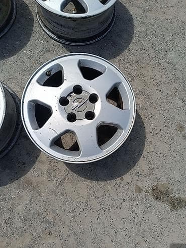 Opel orijinal yüngül lehimli disklər komplekt (4 ədəd)15 lik. -