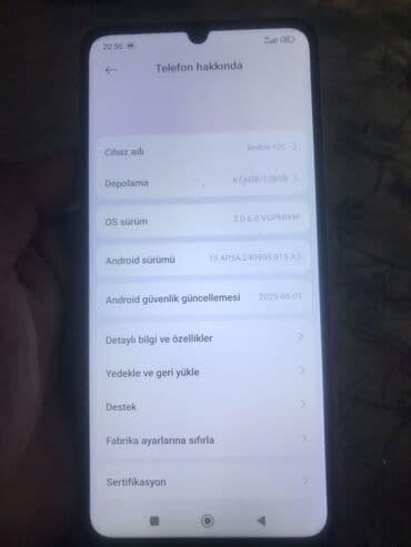 redmi note 15 pro max qiyməti: Redmi markalı smartfon. Telefonun arxa tərəfində "Redmi" loqosu və — 6