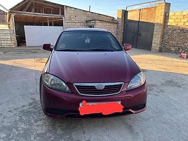 Daewoo Gentra: 1.5 л | 2014 г. Седан