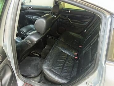 avtobus oturacaq: Volkswagen Passat: 1.8 l | 2003 il Sedan — 7