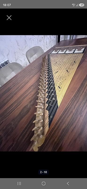 real gitara: Məhsul: Kanon(qanun) musiqi aləti Kanon (qanun) musiqi aləti Alet — 2