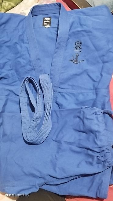 enli şalvarlar: Mavi rəngli döyüş sənətləri geyimi (kimono/gi) dəsti - Üst, şalvar və — 1