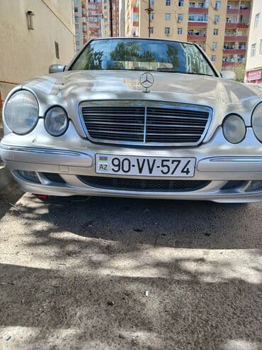 mersedes qapi: Mercedes-Benz E-Class sedan (W210). Gümüşü rəngli, 4 qapılı kuzov — 4