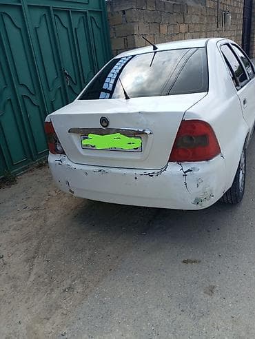 4 teker: Avtomobil: Chery QQ6 (sedan), ağ rəng Kuzov: 4 qapı, ön və arxa — 2