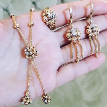 italyan qizili: Dəstə daxildir: Boyunbağı, Kulon, Sep, Pandora, Sarı qızıl, 585 Əyar, 13900 g — 7