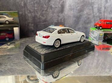 metbex tavan modelleri: Коллекционная модель BMW 750i F02 white 2008 RASTAR Scale 1:43 Art — 3