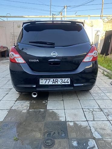 Продажа авто: Nissan Tiida, qara rəng, hetçbek gövdə. - Güclü və qənaətcil benzin — 1
