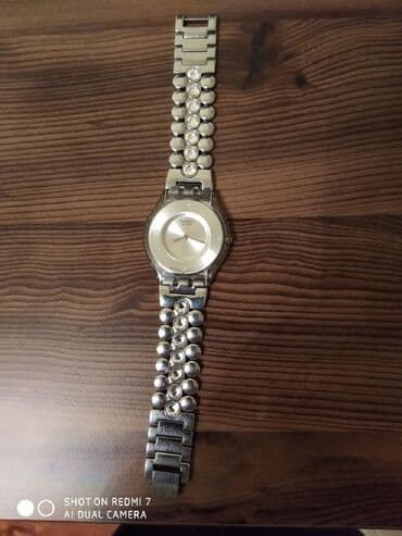 el fecr saat: İşlənmiş, Qol saatı, Swatch — 7
