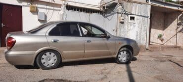 kia sportage 2006: Nissan Sunny: 1.3 l | 2006 il Sedan — 6