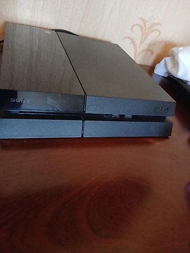 televizor boyuk ekran: Sony PlayStation 4 (PS4) oyun konsolu - Model: PS4 “Fat” (orijinal — 3