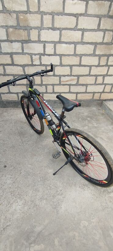 продать велосипед: STRIM 2900 29 luq velosiped 2025 ildə alınıb uzerinde telefon — 2