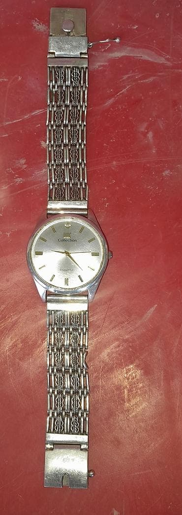 Gümüş kişi qol saatı – qrami 5man - Korpus: metal gumuw - Üz: gümüşü