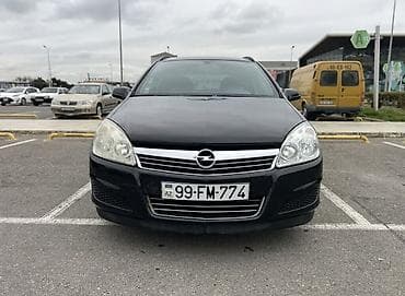 opel astra 2017: Opel Astra H Caravan (universal) – qara rəngdə, 5 qapılı şəhər və ailə — 1