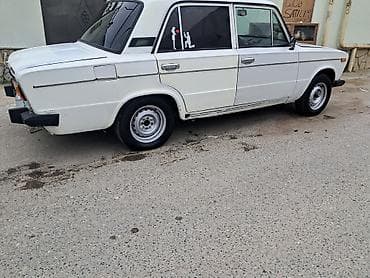 30 kuza: VAZ 2106 sedan, ağ rəng. mator karofka super veizyetde ustundeki — 2