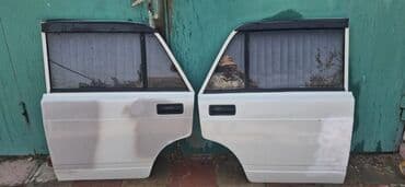 Alışma sistemləri: İki avtomobil qapısından ibarət bu dəst ağ rəngdədir. Hər bir qapı — 1