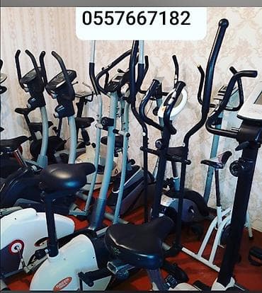 velos: İdman zalı üçün nəzərdə tutulmuş stasionar velosiped. Məşq zamanı — 2