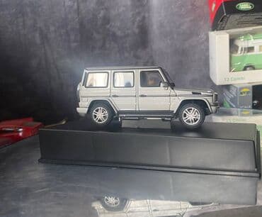 metbex tavan modelleri: Коллекционная модель Mercedes-Benz G-class W463 silver 2012 AutoArt — 14