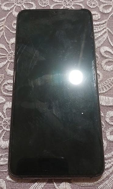 Xiaomi Mi 9 SE smartfon - Ekran: 5.97" AMOLED, damla tipli ön kamera lalafo.az -da Xiaomi Mi 9 SE smartfon - Ekran: 5.97" AMOLED, damla tipli ön kamera