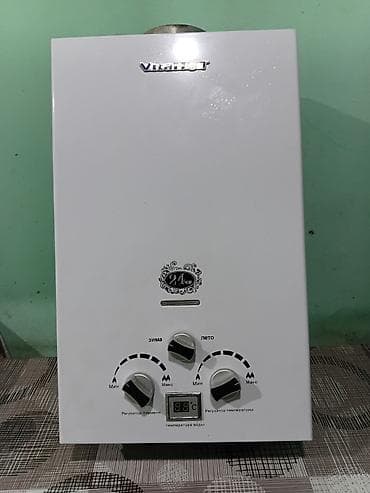 su pompası: VitaHot qazla işləyən axın tipli su qızdırıcısı - Güc: 24 kW — 2