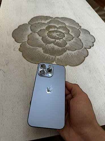 apple airpod: IPhone 13 Pro, 128 GB, Sierra Blue, Face ID — 7