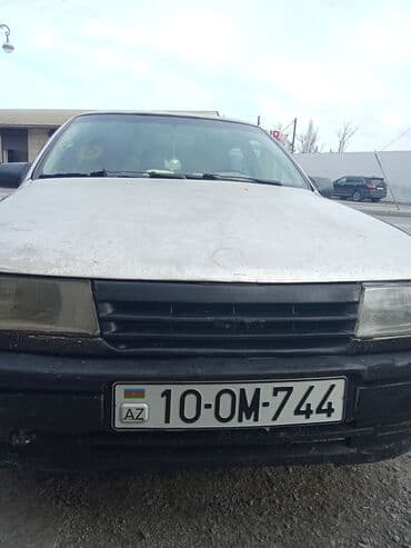 opel ascona: Opel Kadett, sedan, qızılı rəng. - Nömrə nişanı: 10-OM-744 (AZ) - 4 — 1