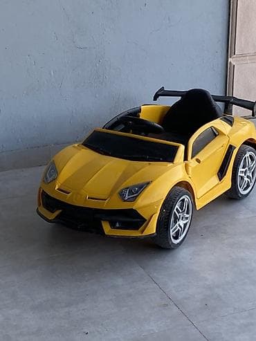 Uşaq üçün elektrikli minik maşını – sarı rəngli sport kupe dizaynı -