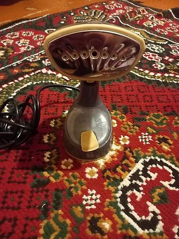 par utuleri: Kompakt buxarlı paltar ütüləyicisi (əl tipi) - Portativ dizayn — 1