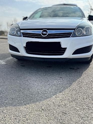 afdomobil: Opel Astra Caravan (Universal) - Kuzzov: universal (Caravan), ağ rəng — 8