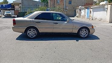 audi a6 c5: Mercedes-Benz C-Class: 2.2 l | 1994 il Sedan — 7