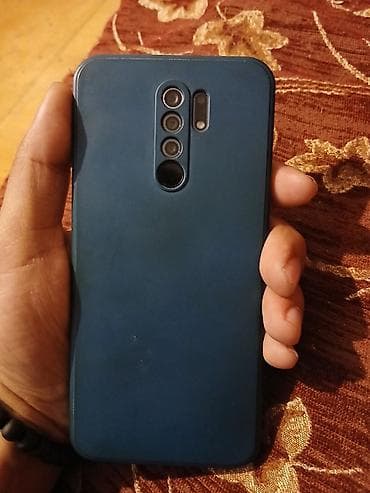 Məhsul: Arxa çoxkameralı smartfon (mavi rəng), qoruyucu silikon