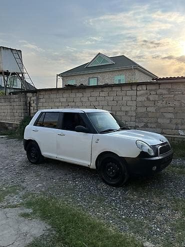 peri: LIFAN Smily (320): 1.3 l | 2013 il Sedan — 9