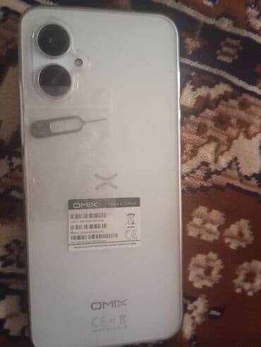 телефон fly iq4514 evo mobi 4: OMIX smartfon Xüsusiyyətlər: - Rəng: ağ - İkiqat arxa kamera modulu — 1