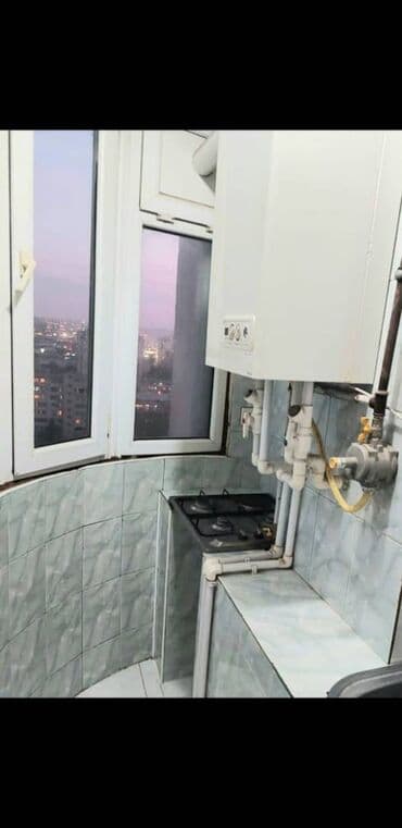 ucuz bina evləri: Nizami rayonunun 24-cü polis bölməsinin qarşısındakı 17 mərtəbəli — 10