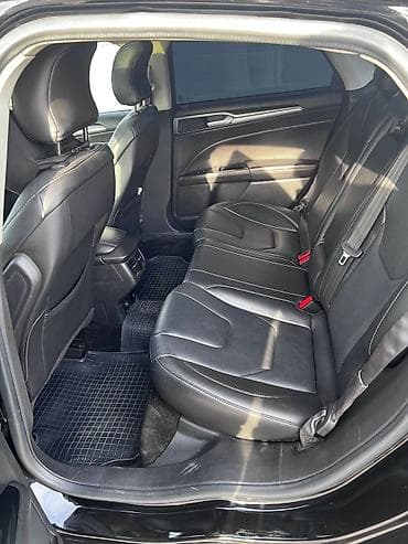 diskler r13: Ford Fusion Energi Titanium – plug-in hibrid sedan Xüsusiyyətlər: - — 6