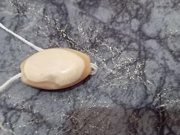 tebiyi saclar: Zob əridən Təbii daşdan hazırlanmış oval kolye asqısı - Material — 9