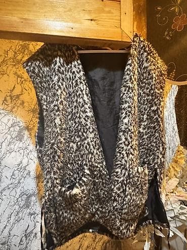 Xəz jilet - Model: Açıq yaxalı, dizdən yuxarı uzunluqda xəz jilet -