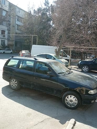 Мототранспорт: Opel Astra: 1.8 л | 1994 г. 443277 км Универсал — 5