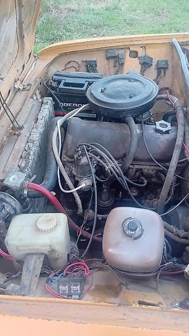 bmw e60 qiyməti: VAZ 2101 (“Jiquli”) sedan - Kuzov: 4 qapılı, narıncı rəng, xrom ön və — 3